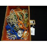 A box containing a quantity of costume jewellery, to include: necklaces, pendants,