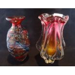 A Murano glass vase of ribbed form, together with an ovoid red glass vase with applied decoration,