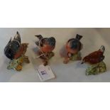 Four Beswick bird figurines, to include: Bulfinch 1042, Wren 993 and Chaffinch 991 (x2).