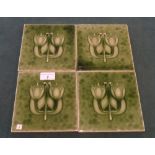 A set of four green glazed Art Nouveau tiles by Flaxman (6in x 6in).