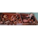 Two boxes containing a large quantity of Porcine related figurines.