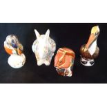 Three Royal Crown Derby paperweights, Brown Pelican and Kingfisher, each with gold stopper,