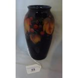 A William Moorcroft Leaf & Berry vase on an Ochre ground, circa 1930 (18cm),