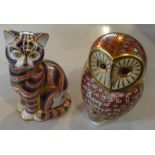 Two Royal Crown Derby paperweights, a Barn Owl and a Cat, each with gold stoppers.