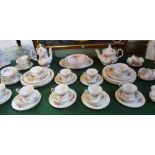 A Royal Albert part-dinner service in the Moss Rose pattern,