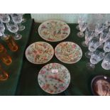 Four Chinese Celadon plates in the Famille Rose palette, the largest 26cm in diameter,