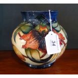 A Walter Moorcroft squat vase in the Anna Lily pattern, impressed and painted marks to base (15cm).