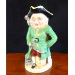 A ceramic Toby musical jug modelled as Long John Silver (27cm).