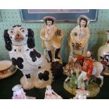 Four Staffordshire figures to include: a pair of flatback figures,