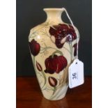 A Moorcroft vase in the Chocolate Cosmos pattern,