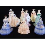 A collection of nine Coalport figurines, to include: Debutante and Minuettes examples,