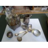 A mixed lot, including: an Edwardian silver plated four bottle cruet, two serviette rings,