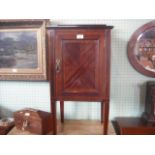 An Edwardian mahogany crossbanded and strung bedside cupboard,