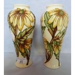 A pair of 1990's Moorcroft earthenware vases of baluster cylindrical tapering form,