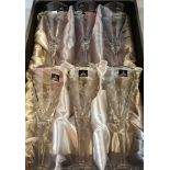 A boxed set of six Royal Doulton champagne flutes.