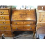 A circa 1930's walnut veneered bureau.