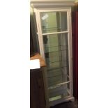 A white painted shop display cabinet,