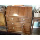 An Edwardian mahogany bureau,