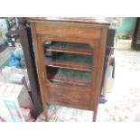 An Edwardian mahogany inlaid and string music cabinet,