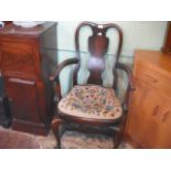 A mahogany Queen Anne-style carver armchair, with tapestry upholstered,