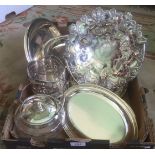 A box of silver plate, including: wine coaster, tureen, biscuit box, basket and other items.