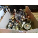 A box of silver plate, including: table candlesticks, bread basket, teapot, sugar scuttle, vases,