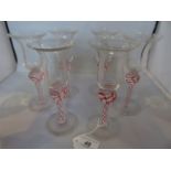 A set of six liqueur glasses, each with trumpet shaped bowl,