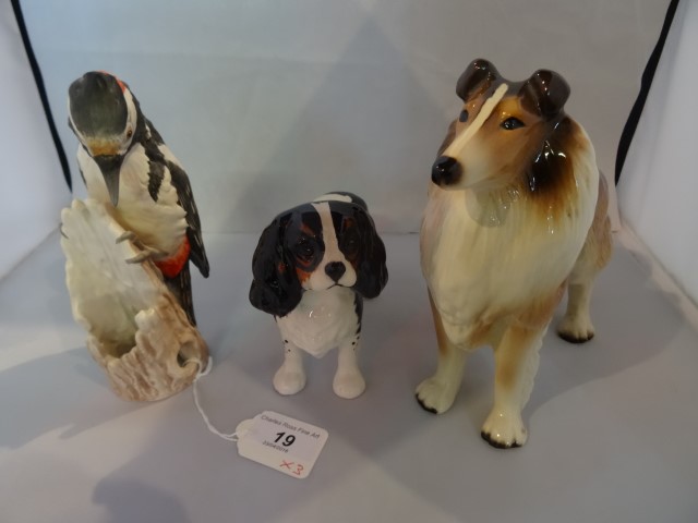 A Beswick model of a tricolour King Charles spaniel,