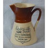 A waisted two-one stoneware loop handled jug, print shield mark for G & A Harwood, Clifton,