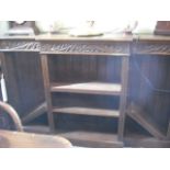 A circa 1900 oak break front library bookcase, with adjustable shelves.