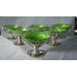 Mappin & Webb, a set of six silver scroll handled footed sundae dishes,