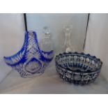 Two clear glass decanters, each with stopper,