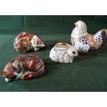 A collection of four Royal Crown Derby paperweights, each with gold stopper,