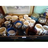 A box containing a quantity of Royal commemorative mugs, to include Wedgwood examples,