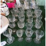 A collection of twenty-four 19th century and later drinking glasses,