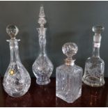 An 'Elizabeth' hand cut lead crystal decanter and stopper, together with three other decanters.