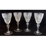 A set of four circa 1880/1900 rock crystal wine glasses,