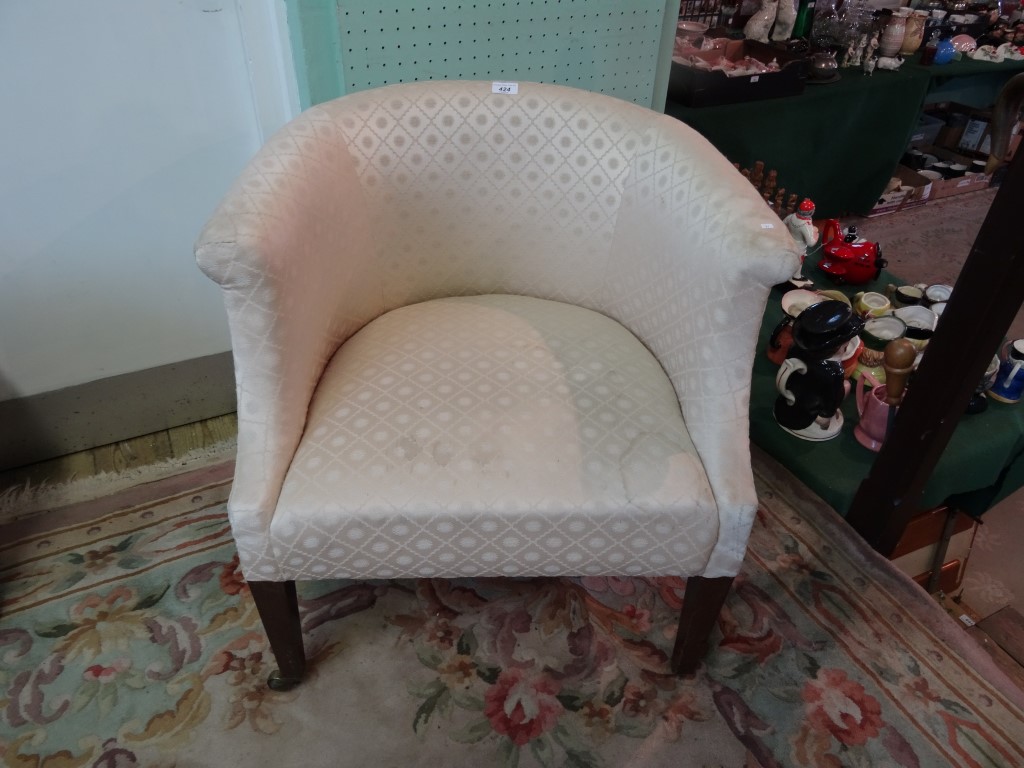 A circa 1930's upholstered tub chair (67cm wide).