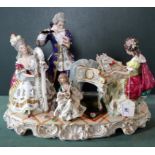 A large Continental porcelain musical figure group, comprising: a seated lady playing a piano,