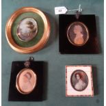 Two 19th century oval portraits of ladies in profile, each in ebonised frames,