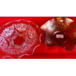 A Carnival glass orange lustre dish, together with a clear pressed glass dish.