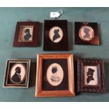 A collection of six 19th century and later portrait silhouettes.