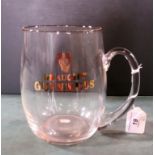 A large Waterford glass single handled tankard, having a Draught Guinness gilt logo (17.5cm).