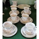 A Paragon Sonata china tea set, comprising: six trios, a cake plate, sugar bowl and cream jug.