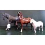 Three Beswick horses, to include: a matt finish Black Beauty, no.