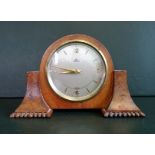 Mid-20th century Elliott clock, the walnut case having circular dial signed Bull,