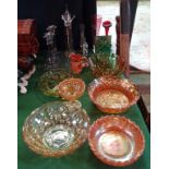 A mixed collection of glass, to include: carnival glass dishes, a pair of clear glass candlesticks,
