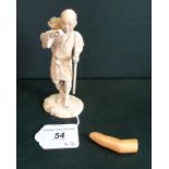 A Meiji period ivory Okimono of a farmer (12cm),