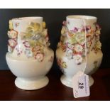 A pair of mid to late 18th century flower encrusted Derby Porcelain vases,