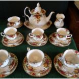 A Royal Albert Old Country Roses tea service, a six place setting comprising: trios, teapot,